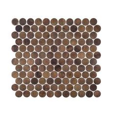 a brown and white tile with circles on it