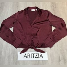 Brand: Aritzia Size: Xs Measurements: See Pics Description: Wilfred Sophisticated And Classy Satin Tie Front Cropped Blouse. Flattering Cut. Spiced Burgundy Color. Near New Condition As It Was Used For One Work Event. Included Stock Photo Of Same Style In Different Colors For Style Reference That Are Currently On Aritzia Website. Original Purchase Price $129. *Discounts: Bundle Items To Save On Shipping And To Receive A Multi-Item Discount. Use Filters To Sort Inventory In My Closet By Category, Burgundy Blouse, Style Reference, Cropped Blouse, Aritzia Wilfred, Crop Blouse, Same Style, Burgundy Color, Top Blouse, Womens Tops