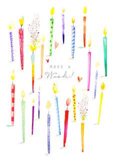 many different colored candles with the words make a wish written on them in black ink