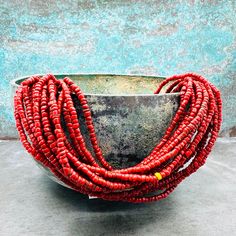 Authentic multistrand necklace from the Bondo tribe in India. Wearable like this or to use for your own projects. The Bonda or Bondo are a primitive tribe in India. It's a matriarchal society which basically means the women do everything. Beside a small skirt, woman wear only beads. It's believed the beads protect them from wild animals and evil spirits when they go hunting in the woods. Also interesting: the woman marry young boys to be sure they will be looked after when they are old... ✔️ Ca Traditional Fair Trade Beads For Jewelry Making, Red Bohemian Necklace With Heishi Beads, Traditional Handmade Heishi Beads Jewelry, Traditional Heishi Beaded Necklaces, Traditional Hand-strung Multi-strand Beads, Traditional Heishi Beads Jewelry With Large Beads, Traditional Large Heishi Beads, Artisan Large Heishi Beads, Traditional Multi-strand Wooden Bead Necklaces