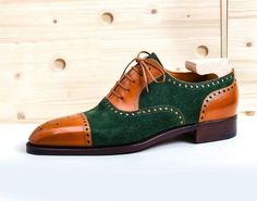 Green Goodyear Welted Leather Shoes, Green Goodyear Welted Wingtip Oxfords, Green Wingtip Oxfords With Goodyear Welt, Green Wingtip Business Dress Shoes, Green Cap Toe Oxfords For Derby, Green Brogue Oxfords With Plain Toe, Green Oxfords With Brogue Detailing, Green Oxfords With Brogue Detailing And Plain Toe, Green Brogue Dress Shoes With Plain Toe