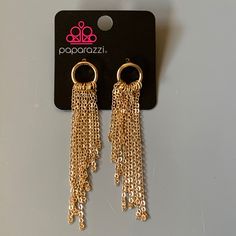 Gold In Color Earrings Chain Dangle Not Associated Directly With Paparazzi. Gold Chain Metal Earrings For Party, Gold Chain Earrings For Parties, Party Earrings With Gold Chain Detail, Party Earrings With Gold Chain, Party Earrings With Adjustable Chain, Chic Dangle Chain Earrings, Trendy Gold Earrings With Dangling Charms, Metal Chandelier Earrings With Adjustable Chain For Party, Silver Dangle Earrings With Gold Chain