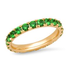 Looking for the perfect stacking ring? Or maybe something extra green? The 14K Gold Large Tsavorite Eternity Band measures 2.8mm thick and features beautiful round tsavorites. On its own, stacked with others or paired with your engagement ring, this playful band is a true wardrobe staple. We promise you don't need to have a May birthday to wear this beauty.Stack our Large Tsavorite Eternity Band with our Tsavorite Domed Ring. 1.8 carats SBR23-YG-TSAV All sales are final. Emerald Eternity Band, Diamond Stacks, May Birthday, Gold Ear Cuff, Full Eternity Ring, Ear Cuff Earings, Diamonds And Gold, Engraved Gifts, Domed Ring