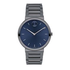 This men’s Bold dress watch from Movado exudes sleek style and modern design in luxurious craftsmanship. Featuring a military grey ion-plated stainless-steel bracelet, 40MM case and bezel with a navy blue dial, this timepiece keeps accurate time with quartz movement. A sapphire crystal provides added protection, and the 30-meter water resistance protects against splashes and spills. The Movado Bold is a perfect accessory for everything from casual to formal occasions. Founded in Switzerland in 1 Classic Gray Watch For Formal Occasions, Timeless Gray Watch For Formal Occasions, Formal Gray Watch With Round Dial, Gray Formal Watch With Round Dial, Modern Gray Chronograph Watch, Modern Gray Watch With Subdials, Modern Gray Watch Accessories With Subdials, Modern Gray Watch With Analog Display, Movado Mens Watches