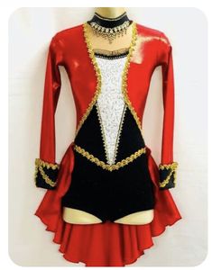 a red and black costume with gold trim