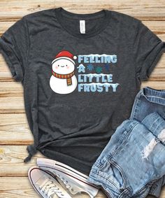 "All T-Shirt apparel are printed using direct-to-garment (also known as DTG). In addition, our inks are water based and eco-friendly. This makes the feel much softer than traditional screen printed shirts, but just as durable. Feeling a little frosty shirt, Snowman shirt, Snowman holiday shirt, Christmas shirt, Winter design, Unisex design, for men and women **All sales are final and we don't accept returns. If we made a mistake we will send a replacement.** The best way to get the size you need Screen Printed Shirts, Snowman Shirt, Made A Mistake, Screen Printing Shirts, Winter Design, Holiday Shirt, Cozy Sweatshirts, Holiday Shirts, Fitted Sweater