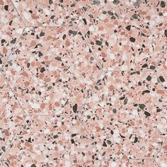 an abstract pink and black tile pattern with small white dots on the top right corner