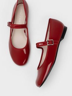 Featuring a glossy patent red finish, these buckled Mary Janes will inject colour and fun into your everyday ensembles. From the familiar feminine silhouette to the comfortable adjustable front straps, these stylish shoes have all the makings of a classic you'll want to wear on repeat. Style them with a little black dress, a statement microbag and a red lip for top marks. Charles And Keith Shoes, Red Mary Jane Shoes, Red Shoes Flats, Shoes Png, Feminine Shoes, Mary Jane Shoes Flat, Red Bodysuit, Classy Shoes, Red Flats