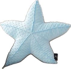 a blue starfish pillow on a white background