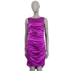 For Sale on 1stDibs - Dolce & Gabbana sleeveless satin ruched dress in orchid purple silk (96%) and elastane (4%) with a round neck. Closes on the back with a zipper. Lined Elegant Purple Sleeveless Evening Dress, Silk Evening Dress With Ruched Sides, Ruched Silk Sheath Dress, Silk Draped Dress With Ruched Back, Formal Ruched Sleeveless Dress, Sleeveless Stretch Satin Dress For Formal Occasions, Ruched Sleeveless Dress For Formal Occasions, Sleeveless Ruched Satin Dress For Cocktail, Sleeveless Silk Satin Dress With Pleated Bodice