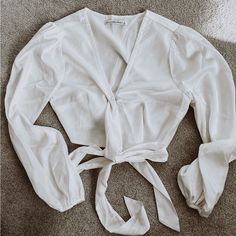 New Without Tags Abercrombie Satin Crop Tie Top! Size Small. Purchased And Never Worn. Perfect Condition. Asking $30 Obo. Willing To Negotiate Price. See Photos For Details. Clasp Front Closure With Ties. From A Smoke Free Home! Fitted Off-white V-neck Top, Off White V-neck Top For Brunch, Fitted V-neck Off White Top, Chic Off-white V-neck Blouse, Fitted Off-white Top For Brunch, Fitted Off White Top For Brunch, Chic White Tops For Brunch, Fitted Off White Blouse For Day Out, Chic White Cropped Blouse