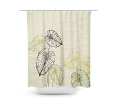 a shower curtain with leaves on it