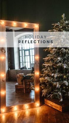 a christmas tree sitting in front of a mirror with the words holiday reflections on it