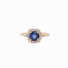 This beautiful ring features a 0.81 carat square emerald cut Blue Sapphire gemstone with a halo of natural earth mined diamonds set in solid 14K gold. This Blue Sapphire ring makes a lovely September birthstone gift for your loved ones! This ring is made with solid 14K Gold and natural Earth mined SI / G-H diamonds. As listed, this ring is ready to ship. If you're interested in purchasing this setting with a different center stone please message us!