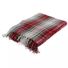 a red and grey plaid blanket with fringes on the ends is laying flat against a white background