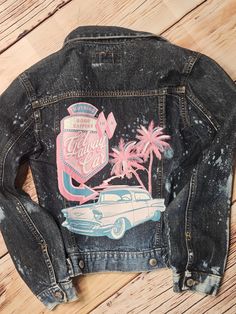 This gently used small-sized Old Navy denim jacket has been revitalized with a hand-bleached, distressed design and a printed motif on the back for a fresh, youthful appearance. All marks and imperfections are intentional to add character. This would make a great addition to your fall wardrobe. Distressed Grunge Cotton Denim Jacket, Grunge Distressed Cotton Denim Jacket, Grunge Cotton Denim Jacket Distressed, Acid Wash Distressed Cotton Denim Jacket, Distressed Acid Wash Denim Jacket, Retro Faded Washed Denim Jacket, Faded Pre-washed Cotton Denim Jacket, Retro Cotton Acid Wash Denim Jacket, Retro Acid Wash Cotton Denim Jacket