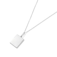 This clean new classic rectangle pendant will add a luxe touch of modernity to any look. Pair with a t-shirt or tank top to elevate the everyday. 14k gold or rhodium plated rectangle charm on 1.2mm Rae cable chain. Adjustable 18-20". Trevi Charm: 20mm x 15mm x 2mm