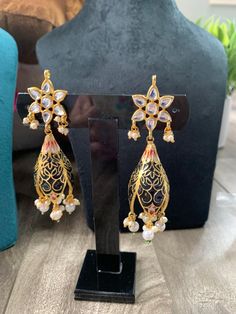 By purchasing these Party Wear earrings from Aadhik Gems & Jewels new collection, you can demonstrate your enthusiasm for traditional jewellery. They are perfect for wearing at any festival. Cheap Meenakari Danglers For Festivals, Artificial Earrings, Peacock Earrings, Traditional Jewellery, Fashion Statements, Antique Inspiration, Traditional Jewelry, Antique Style, Handmade Earrings