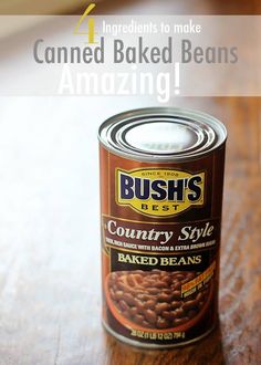 a can of baked beans sitting on top of a wooden table