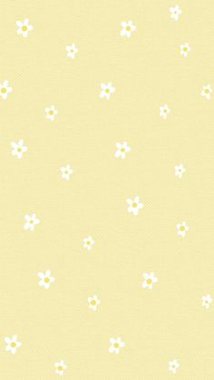 a yellow background with small white flowers on the bottom and one flower in the middle