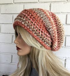 Boho Slouchy hat handmade crochet pastel colors, coral beige pattern This hat is made of a bulky weight yarn with shades of peach, coral, beige and white. This hat is a bit oversized and very pretty but warm as well. If you are not completely happy with your purchase you can send it back for a complete refund. You can visit my shop at: http://www.freespirithats.etsy.com Bohemian Crochet Hat For Beach In Fall, Handmade Beige Hat For Fall, Fall Beige Crochet Hat, Bohemian Crochet Beach Hat For Fall, Bohemian Cream Crochet Hat One Size, Bohemian Crochet Hat In Cream, Handmade Bohemian Crochet Hat For Fall, Bohemian Crochet Hat In Cream One Size, Casual Handmade Cream Crochet Hat