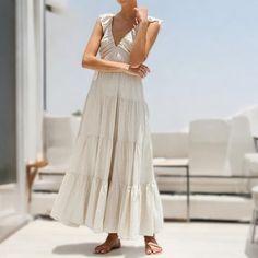 Flowy Boho Summer Maxi Dress, Boho Beach Dress, Vintage Layered Dress, Women Chic Boho Dress, Hippie Bohemian Wedding Dress Gift For Her Embrace effortless elegance with our Boho Flowy Summer Maxi Dress, a perfect blend of vintage charm and modern bohemian style. This stunning dress is ideal for boho weddings, beach outings, or any summer event. Its flowing silhouette and delicate design make it a timeless addition to any wardrobe, capturing the free-spirited essence of boho chic. 🏖️ ❖ Material Bohemian V-neck Maxi Dress For Beach Wedding, Beige Floor-length Maxi Dress For Beach, White Floor-length Boho Dress For Vacation, Bohemian Ruffled Maxi Dress For Vacation, Beach Wedding Sundress In Maxi Length, Summer Bohemian Tiered Boho Dress, Ruffled Maxi Dress For Beach Cover-up, Sleeveless Boho Dress With Ruffles For Beach, Summer Tiered Bohemian Boho Dress