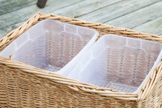 two plastic containers in a wicker basket