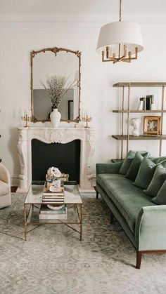 a living room filled with furniture and a fire place in the middle of a room