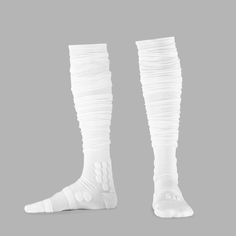 Choose padded socks designed to protect your feet and legs for the long haul with your completing tryouts or in a game. The best padded socks from SLEEFS will provide complete support to your feet with extra padding, designed to protect sensitive areas like your ankles. With padded football socks, it is less likely that you will sustain a significant injury during a fall. These padded running socks are also designed to keep levels of moisture under control. Stop sweat or water soaking your feet White Stretch Nylon Socks, Compression Knee-high Socks In White, White Compression Knee-high Socks, Football Pads, Soccer Socks, Football Socks, Knee Sleeves, Leg Sleeves, Running Socks