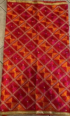 Mothers day gift orange pink colour Phulkari Dupatta for women | Phulkari also called Indian Dupatta | Used as Dupatta Stole  Phulkari is traditional artwork of Embroidery indigenous to Punjab region of India. Punjabi women traditionally created it with hand over many days to gift/wear on occasions. This heritage of Punjab is preserved in our Phulkari Dupatta. Hope you have a glimpse of this rich heritage through our Dupattas.  Our feather-soft threads have the lustre that will add a distinct sparkle to your look. Be it your traditional outfit or a modern ensemble, a phulkari dupatta can never go wrong in adding its appeal to your elegance. These timeless pieces will always stay as your prized possessions.  Light Phulkari Dupatta for Women with Full Hand Work All Over It Premium Multi Colo Affordable Multicolor Dupatta For Celebrations, Orange Chanderi Traditional Wear With Mirror Work, Diwali Orange Embroidered Fabric With Zari Work, Traditional Orange Saree With Gota Work, Orange Gota Work Saree For Diwali, Diwali Orange Saree With Gota Work, Orange Saree With Gota Work For Festivals, Orange Chanderi Dupatta With Dori Work, Festive Orange Embroidered Fabric With Zari Work