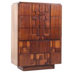 a wooden cabinet with many squares on the front and sides, made out of wood