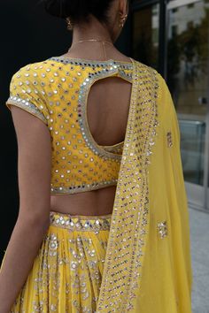 Aurelia Yellow Lehenga Choli- Hand Sequence, Mirror, Beads Embroidery Introducing our stunning Aurelia Yellow Lehenga Choli, a masterpiece of artistry and elegance. This exquisite ensemble is adorned with meticulous hand sequence, mirror, and bead embroidery, creating a breathtaking visual spectacle. Immerse yourself in the enchantment of this ensemble, designed to make you feel like a true vision of grace and beauty. Yellow Blouse with Rounded Sweetheart Neckline Rounded Sweetheart Neckline giv Traditional Hand Embellished Pre-draped Saree For Diwali, Traditional Anarkali Set With Hand Embellished Drape, Traditional Hand Embellished Anarkali Set With Drape, Traditional Hand Embellished Anarkali Set, Traditional Hand Embellished Choli For Reception, Traditional Gold Hand-embellished Choli, Traditional Drape Choli Hand Embellished For Festivals, Traditional Drape Hand Embellished Choli For Festivals, Traditional Hand Embellished Gold Choli