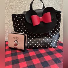 A Lightly Used Minnie Mouse Backpack Purse With Matching Wallet Pink Wallet With Dust Bag For Travel, Cute Black Leather Bag, Kate Spade Black Backpack With Removable Pouch, Kate Spade Bag With Removable Pouch As Gift, Kate Spade Bags With Removable Pouch As Gift, Kate Spade Pink Bag For Gift, Pink Kate Spade Bag As A Gift, Pink Kate Spade Bag As Gift, Trendy Kate Spade Wallets For Travel