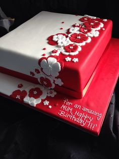 two red and white cakes on top of each other