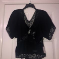 Nwt Forever 21 Top Color: Black Batwing Sleeves Lined With Lace Size: Medium Halfway Between Crop Top And Stops At Hips Another Shirt That Was Hard To Photograph, I’ll Put Up Better Photos Later Stretch Black Tops For Daywear, Black Tops For Going Out In Spring, Black Tops For Spring Loungewear, Black V-neck Top For Daywear, Black Fitted Tops For Daywear, Fitted Black Top For Daywear, Black Lace Top Blouse For Daywear, Forever 21 Black Fitted Blouse, Forever 21 Black Short Sleeve Top