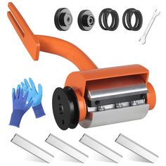 an orange hand operated stapler with gloves and other accessories