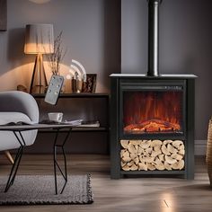 a fire place with logs in front of it and a wicker basket on the floor