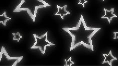 many white stars on a black background