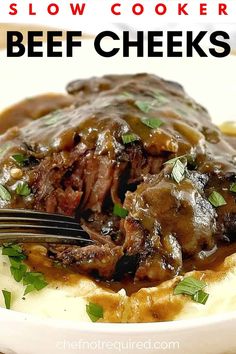 this slow cooker beef and gravy is ready to be eaten with a fork