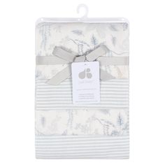 a white and blue blanket with grey ribbon