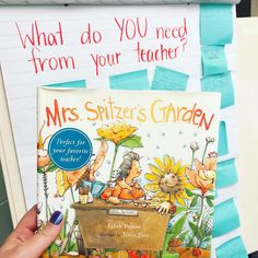 a person holding up a book about what do you need from your teacher? by mrs stilter's garden