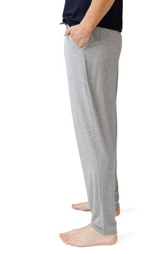 Enjoy a luxurious sleep in these breathable PJ pants crafted from moisture-wicking fabric with a comfy drawstring waist. Moisture-wicking fabric engineered for dryness and comfort   95% viscose, 5% spandex   Machine wash, tumble dry   Imported   OEKO-TEX®–certified materials free of harmful substances Joggers With Comfort Waistband For Relaxation, Comfortable Joggers For Relaxation, Comfort Waistband Joggers For Lounging, Comfortable Joggers For Lounging, Long Pants Sleepwear With Elastic Waistband, Sporty Sleepwear With Elastic Waistband And Relaxed Fit, Sporty Sleepwear With Elastic Waistband For Relaxation, Sporty Sleepwear With Elastic Waistband, Loosely Fitted Joggers For Loungewear