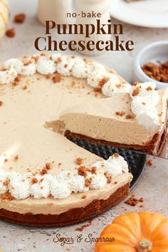 no - bake pumpkin cheesecake on a plate with the remaining slice cut out