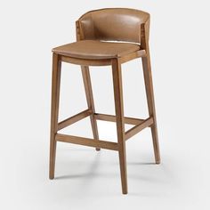 a wooden stool with a tan leather seat and backrest, viewed from the front