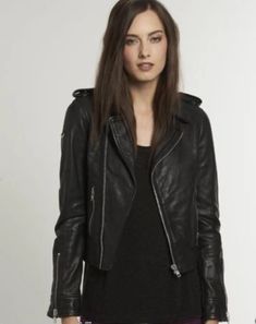 Introducing our stunning New Women Leather Jacket in classic black color. Crafted from high-quality genuine leather, this jacket is a must-have addition to any fashion-forward woman's wardrobe. 
Made from genuine lambskin leather, the shell of this jacket offers a luxurious and soft feel that exudes elegance and sophistication. The soft cotton and silk fabric lining ensures maximum comfort and breathability, allowing you to wear this jacket all day long without feeling restricted.
Featuring a front zip fastening, this jacket not only provides an easy and convenient way to put it on and take it off, but it also adds a trendy and stylish touch to the overall design. The zip fastening cuffs further enhance the jacket's modern appeal, giving it an edgy and contemporary look.
With two side pock Leather Jacket Zipper, Black Biker Jacket, Distressed Leather Jacket, Womens Black Leather Jacket, Best Leather Jackets, Fashion 2014, Sheepskin Jacket, Womens Jackets, Basic Jackets