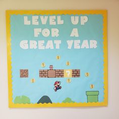 a poster on the wall that says level up for a great year with an image of mario