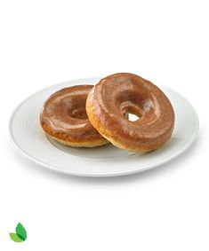 two glazed donuts on a white plate