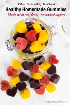 heart shaped gummy bears in a jar with text overlay that reads healthy homemade gummies made with real fruit - no added sugar