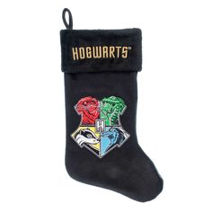 a harry potter christmas stocking with hogwarts on it