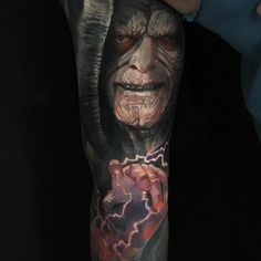 a person with a tattoo on their arm